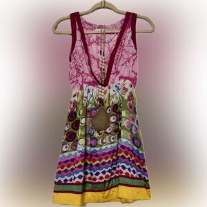 Luv 2 Luv boutique purchased tunic with bold & beautiful colors! Never worn!